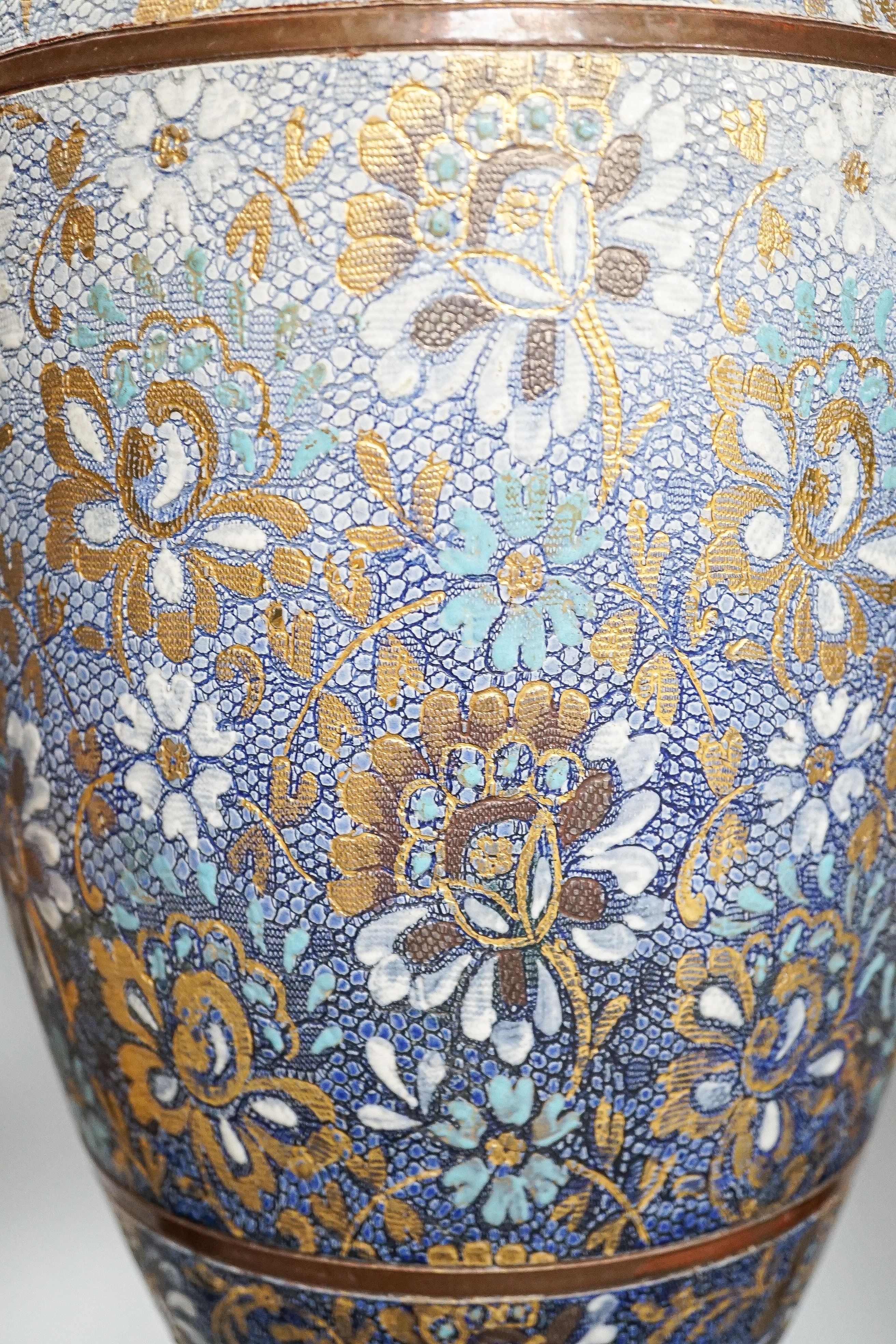 A large Doulton Slater's Patent vase, 46cm and a pair of similar smaller vases, 34cm